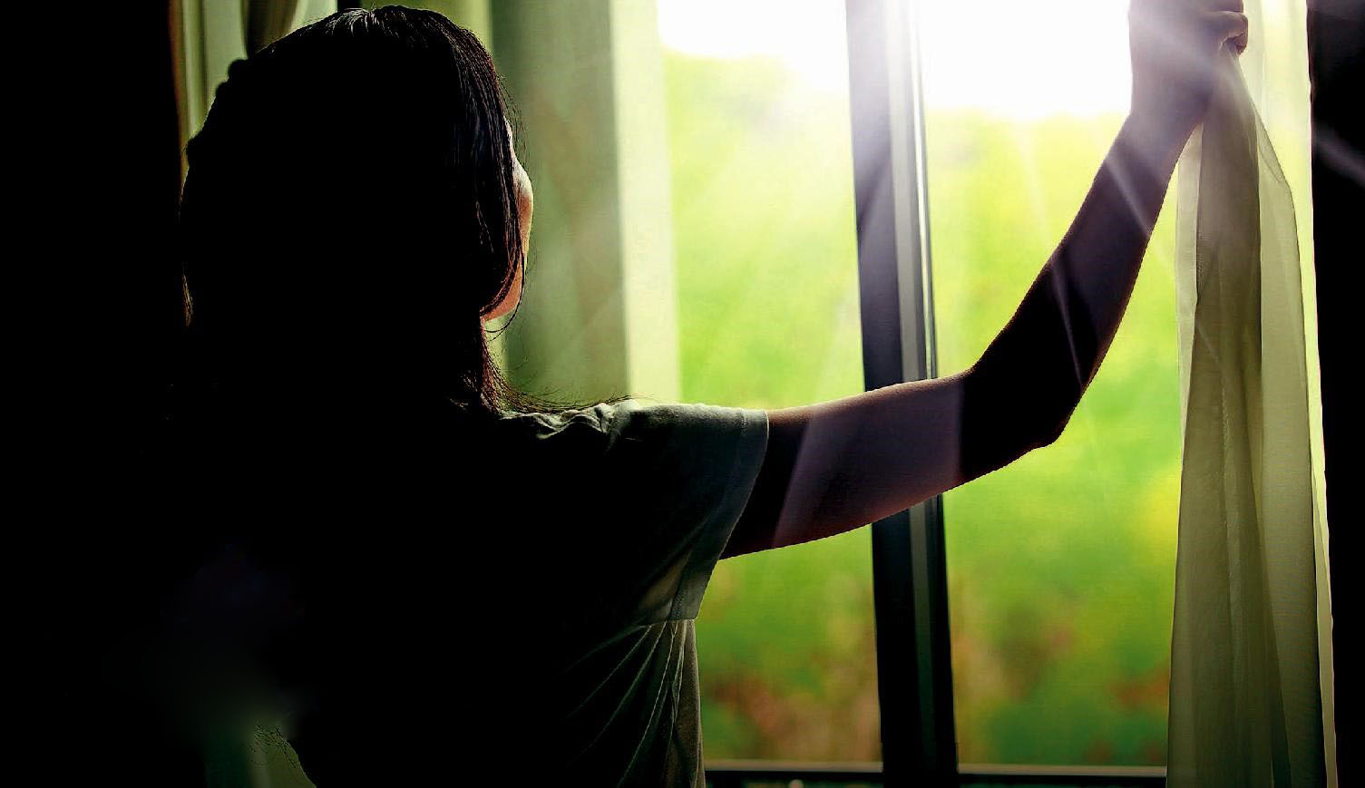 The winter sun shining, possibly causing fading through the windows of the homes.